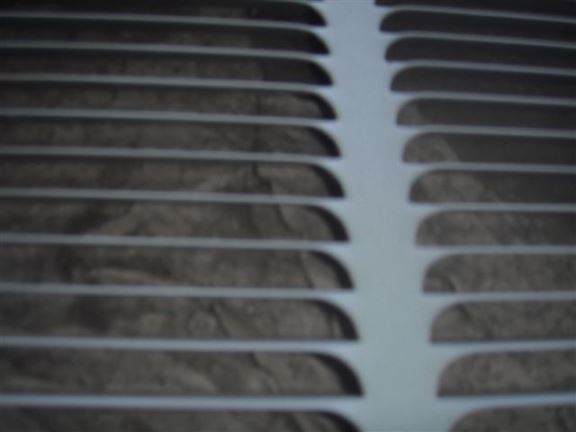 The debris inside this air conditioner will cause overheating and poor efficiency.