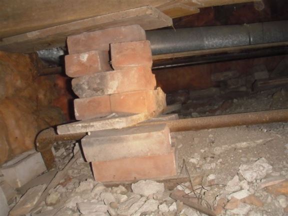 This is a common improper support pillar found in crawl spaces.