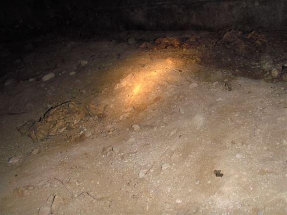 This house in Thamesville shows an earth-floor crawl space requiring a plastic moisture barrier covering.