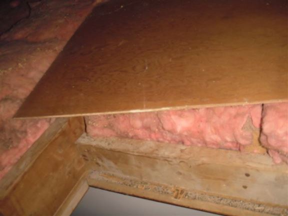 This attic hatch should be insulated and sealed.