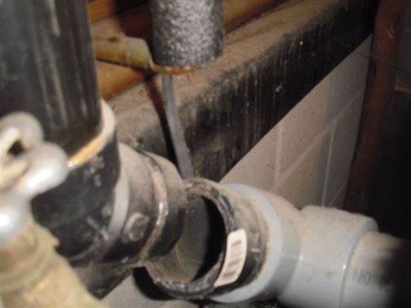 This water heater exhaust flue was separated, sending carbon monoxide into the house.