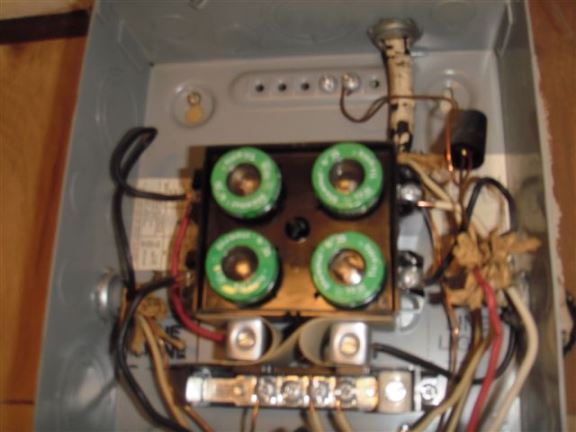 The wires used here are rated for 15 amp fuses but they feed into a 30 amp breaker.